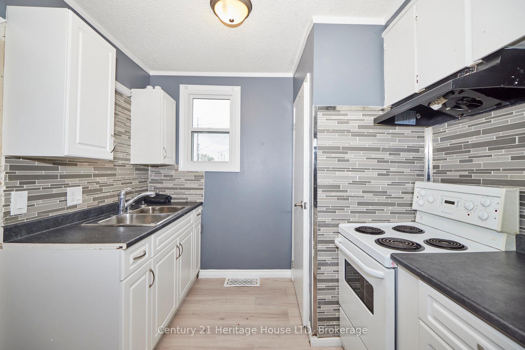 Photo 8 of 407 Welland Avenue, St. Catharines, Facer — HOMEH