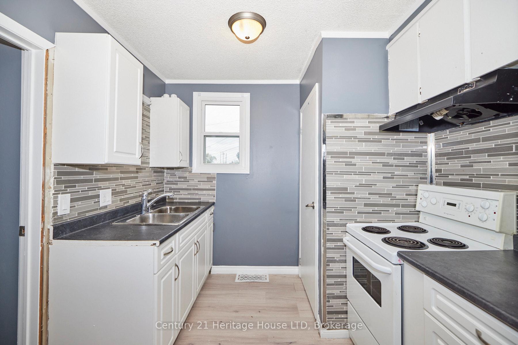 Photo 9 of 407 Welland Avenue, St. Catharines, Facer — HOMEH