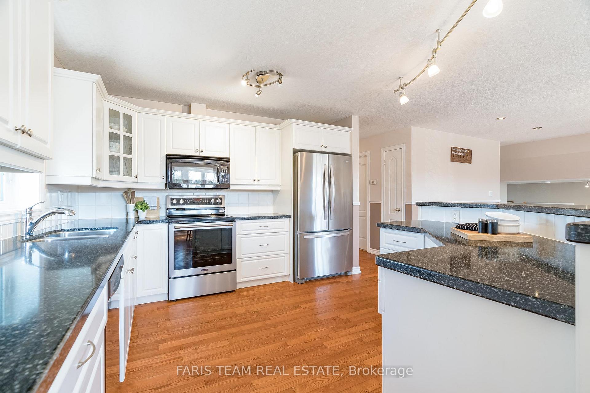 Photo 10 of 1032 Flos Road 4 E, Springwater, Phelpston — HOMEH