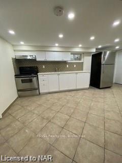 Photo 3 of Unit lower, 28 1/2 Division Street, St. Catharines, E. Chester — HOMEH