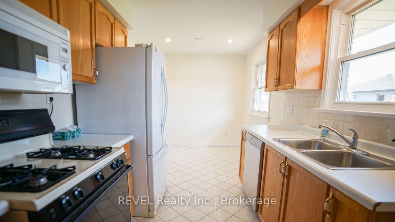 Photo 11 of Unit MAIN, 352 Bunting Road, St. Catharines, Carlton/Bunting — HOMEH