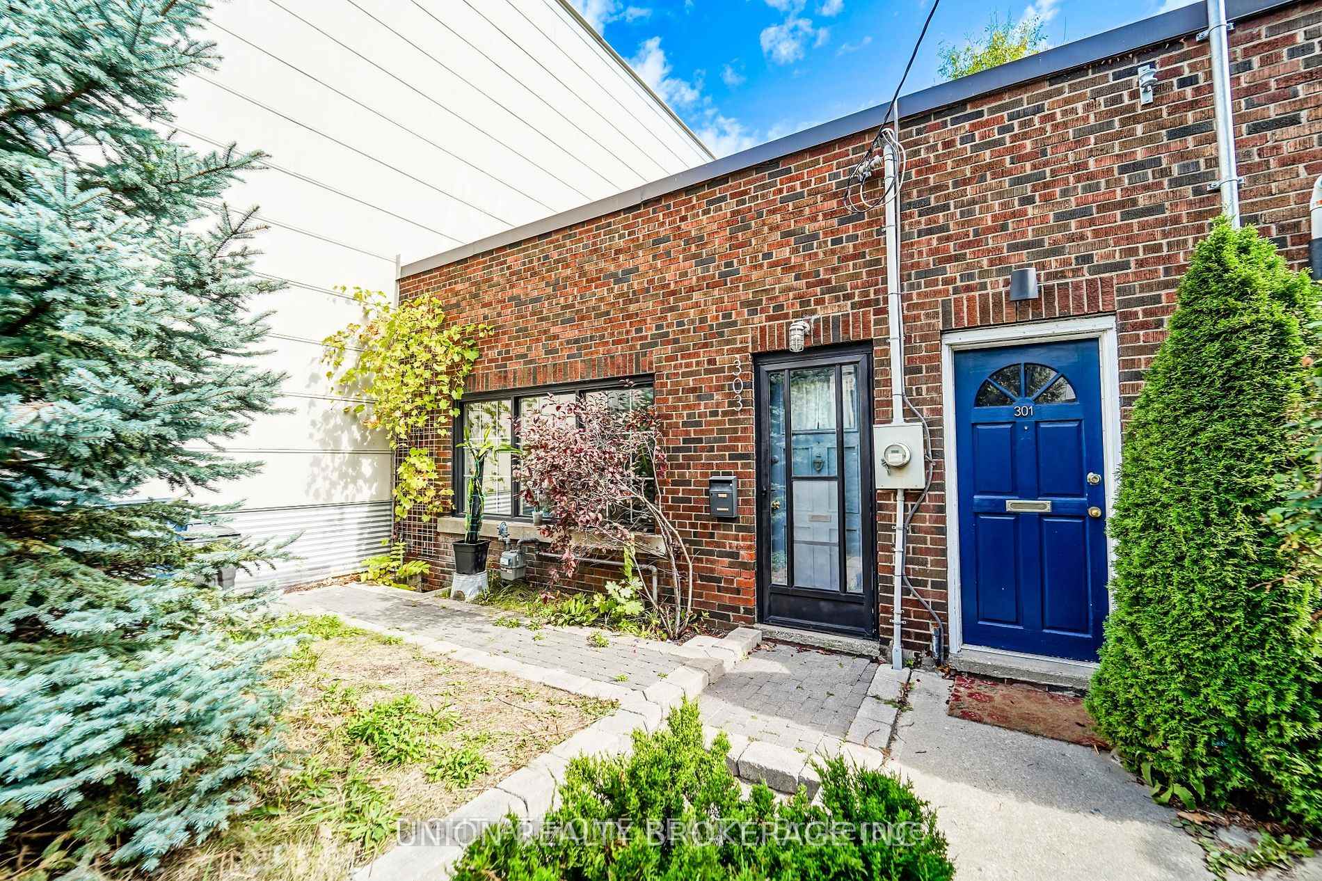 Front of 303 Coxwell Avenue
