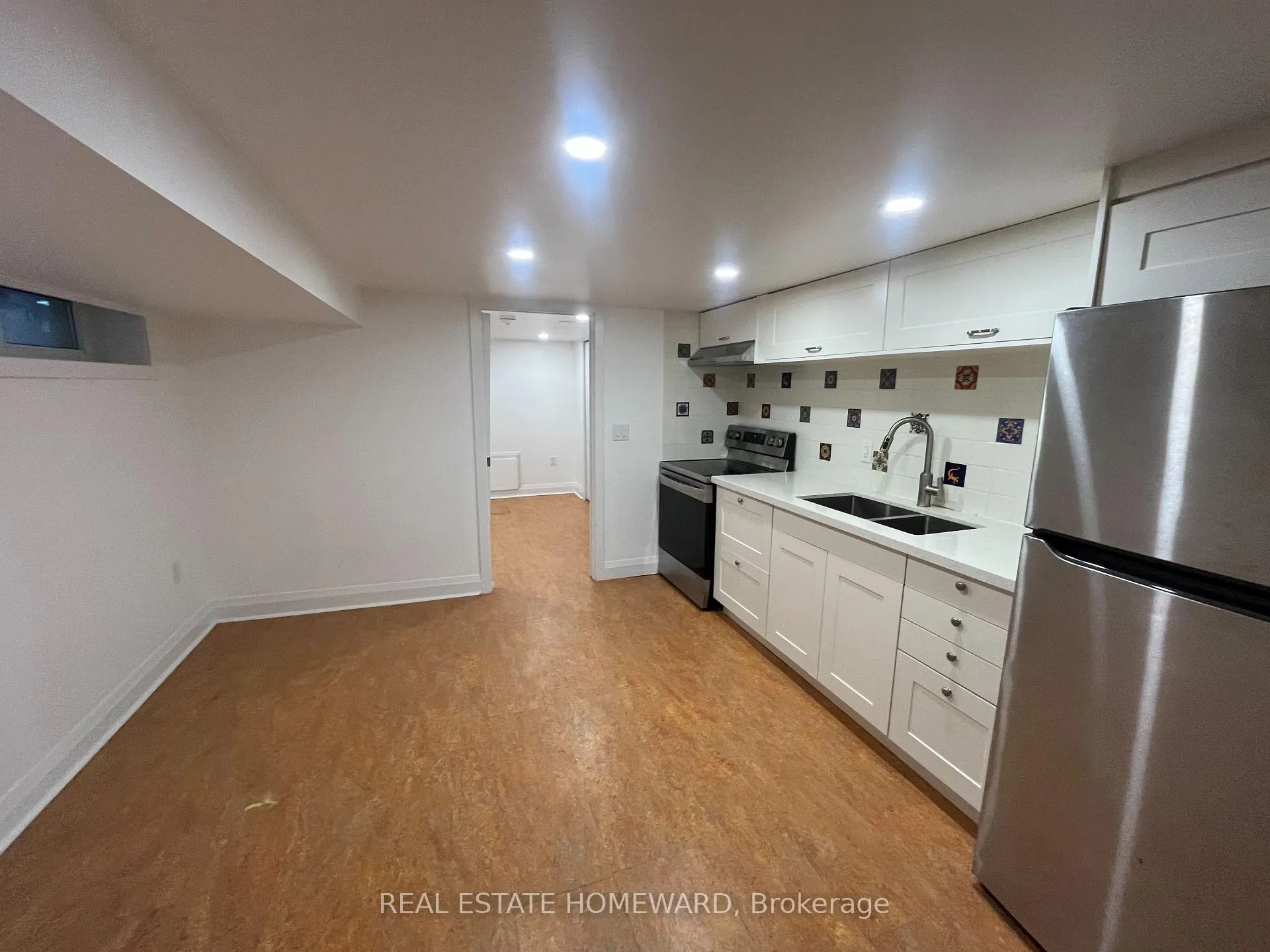 Photo 3 of Unit Lower, 15 Richard Avenue, Toronto, Greenwood-Coxwell — HOMEH