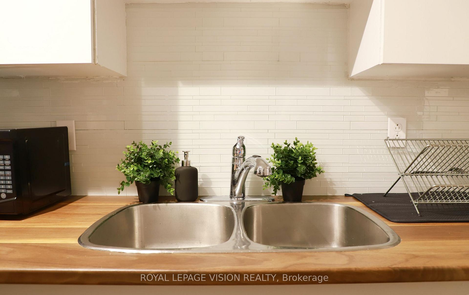 Photo 5 of Unit Upper, 1242 Danforth Avenue, Toronto, Danforth — HOMEH
