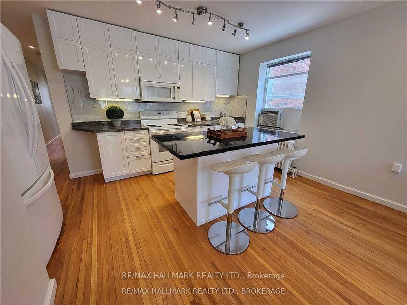 Photo 3 of Unit Main, 8 Bonfield Avenue, Toronto, The Beaches — HOMEH