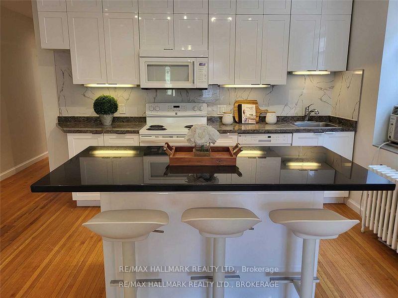 Photo 4 of Unit Main, 8 Bonfield Avenue, Toronto, The Beaches — HOMEH