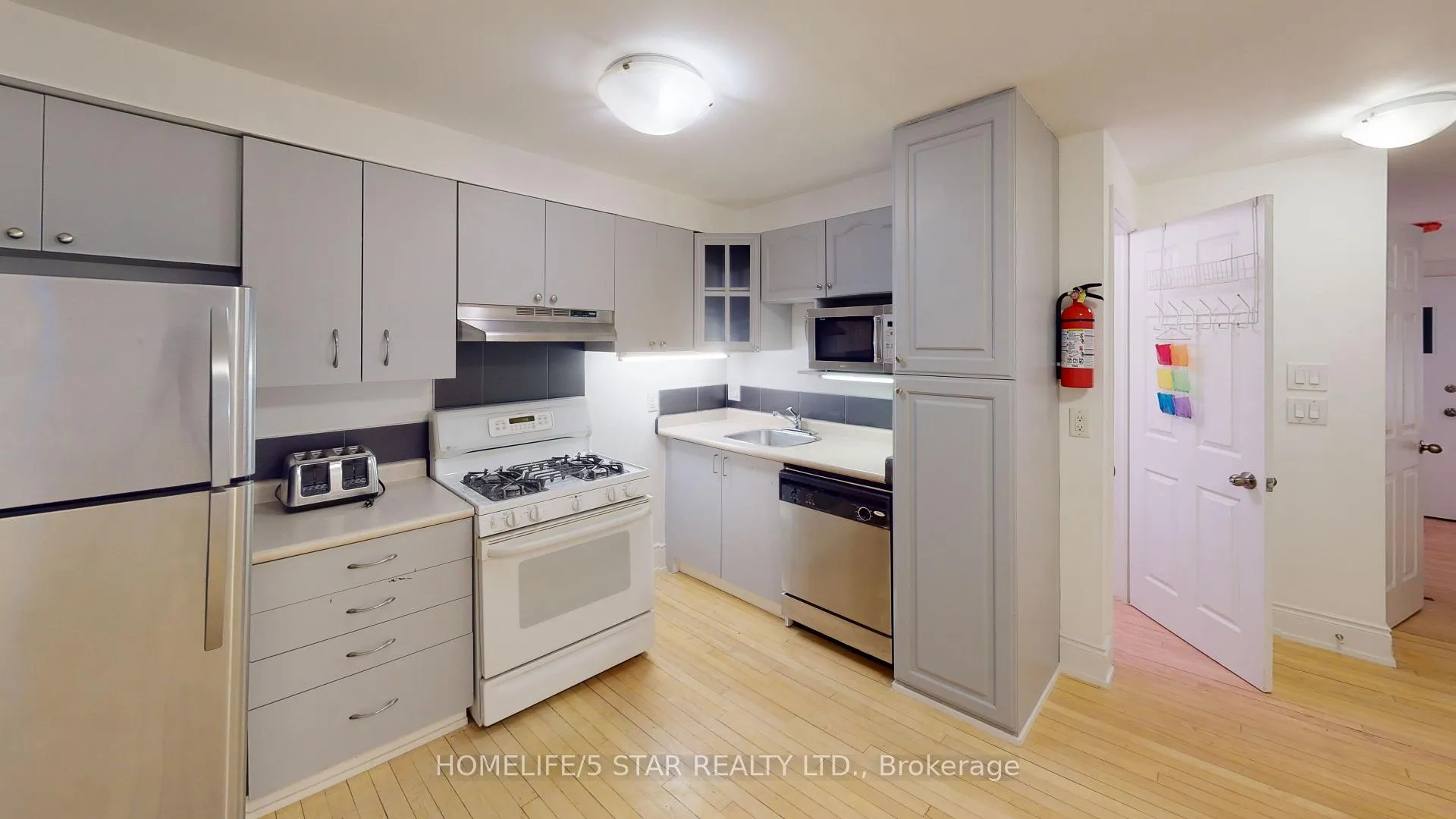 Photo 3 of Unit 209, 1152 Gerrard Street E, Toronto, South Riverdale — HOMEH