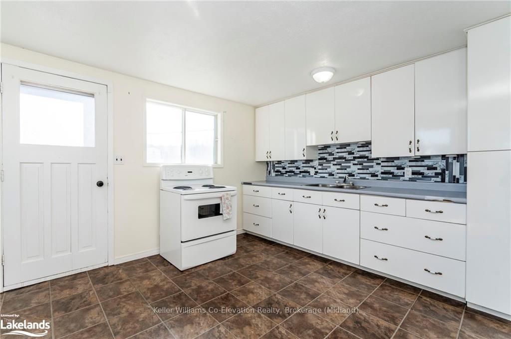 Photo 6 of 555 Champlain Road, Tiny, Rural Tiny — HOMEH