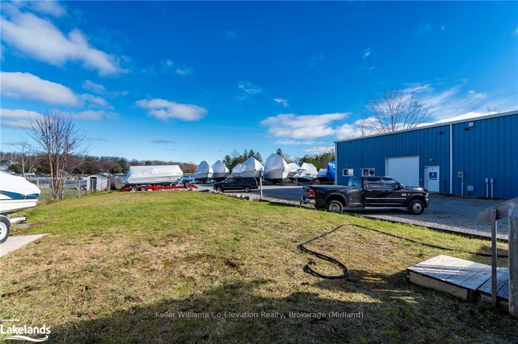 Photo 33 of 555 Champlain Road, Tiny, Rural Tiny — HOMEH