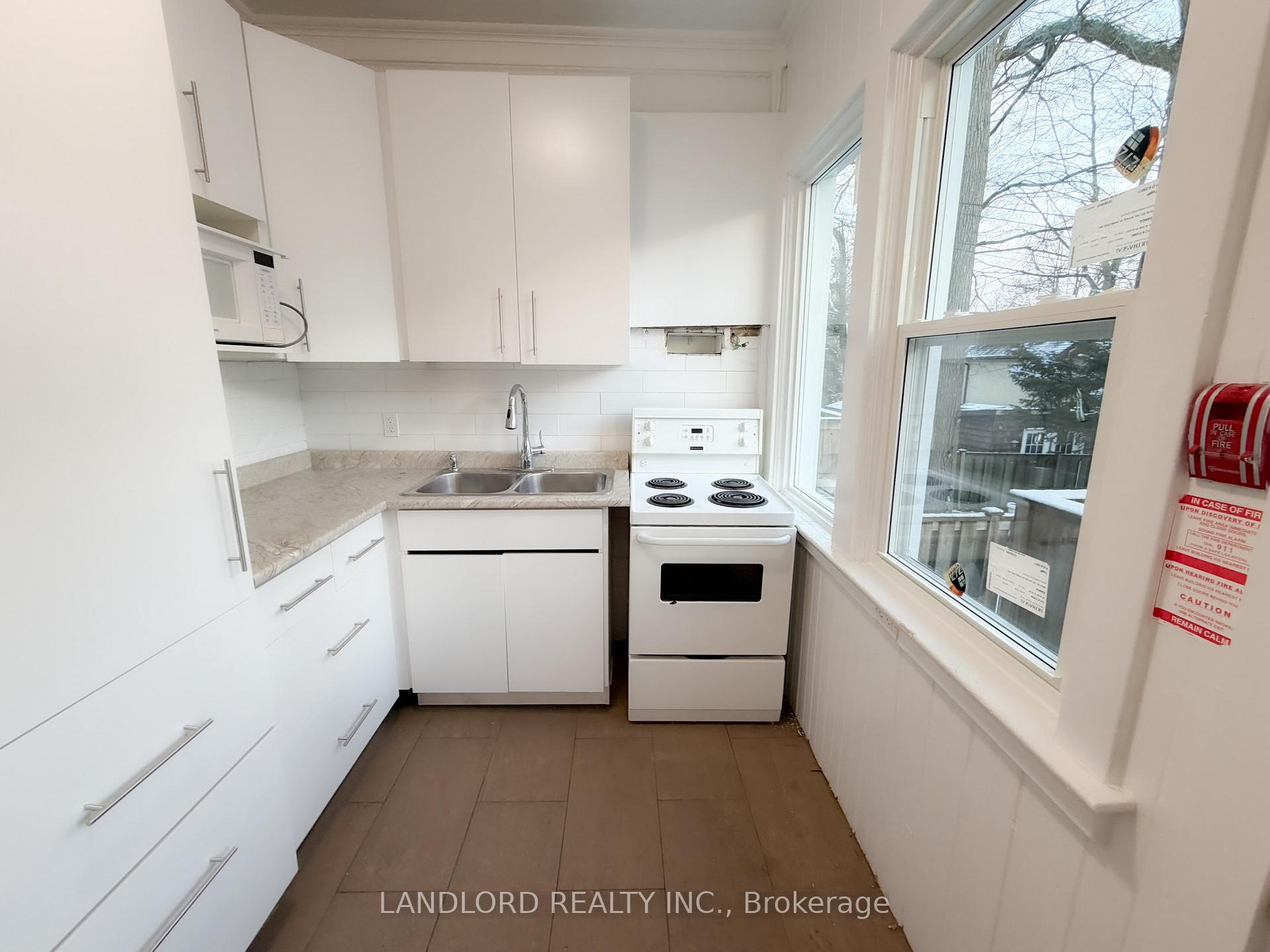 Photo 3 of Unit 1, 2469 Queen Street E, Toronto, The Beaches — HOMEH