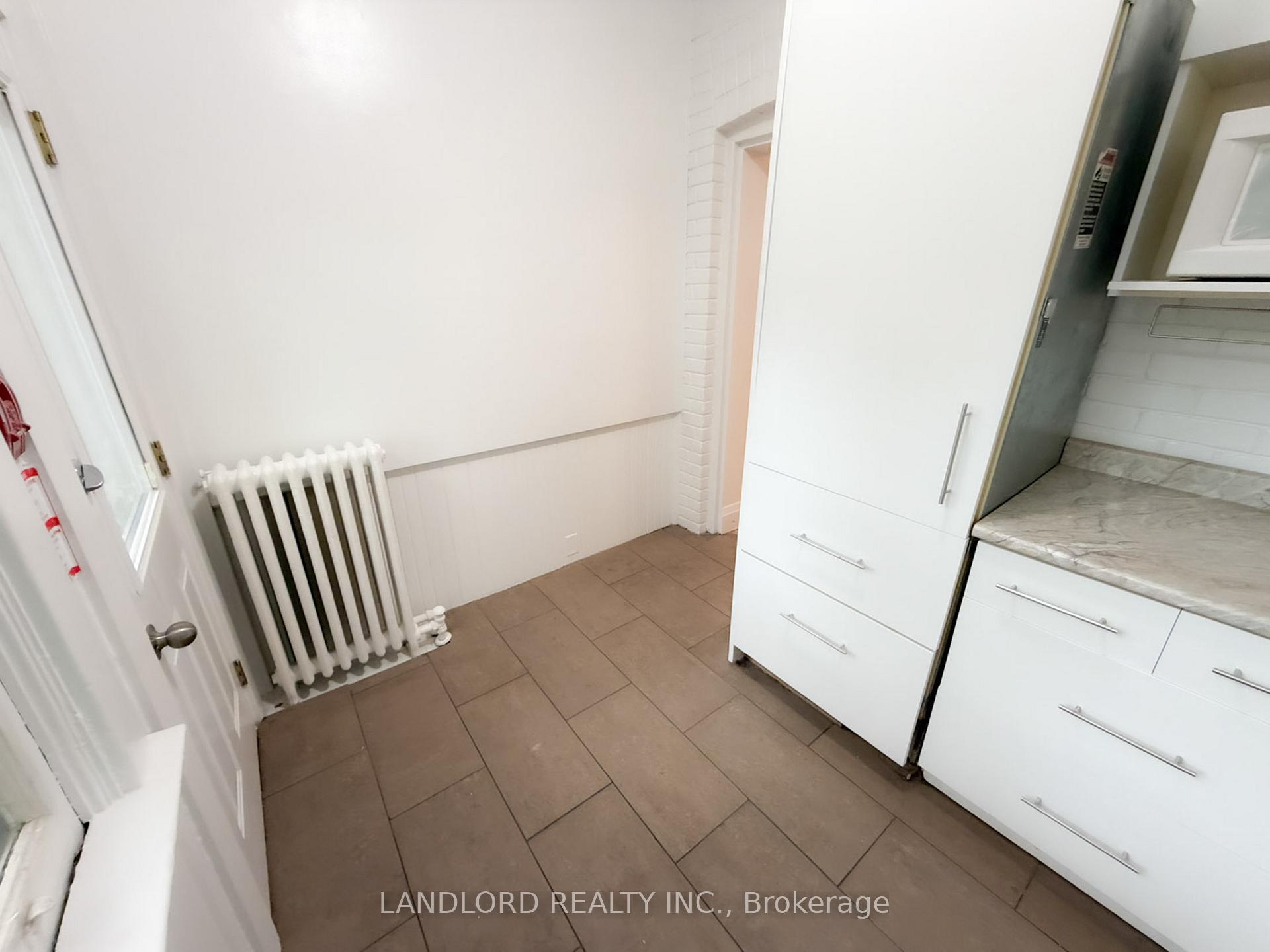 Photo 4 of Unit 1, 2469 Queen Street E, Toronto, The Beaches — HOMEH