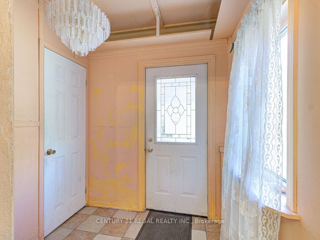 Photo 4 of 11 Midburn Avenue, Toronto, Crescent Town — HOMEH