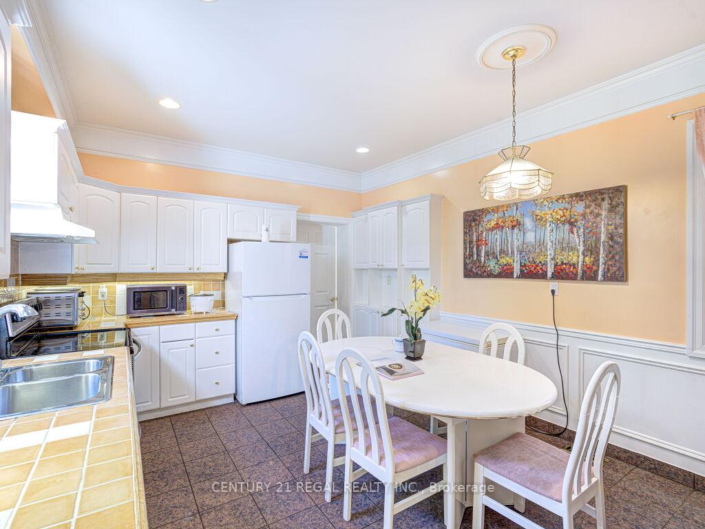 Photo 12 of 11 Midburn Avenue, Toronto, Crescent Town — HOMEH