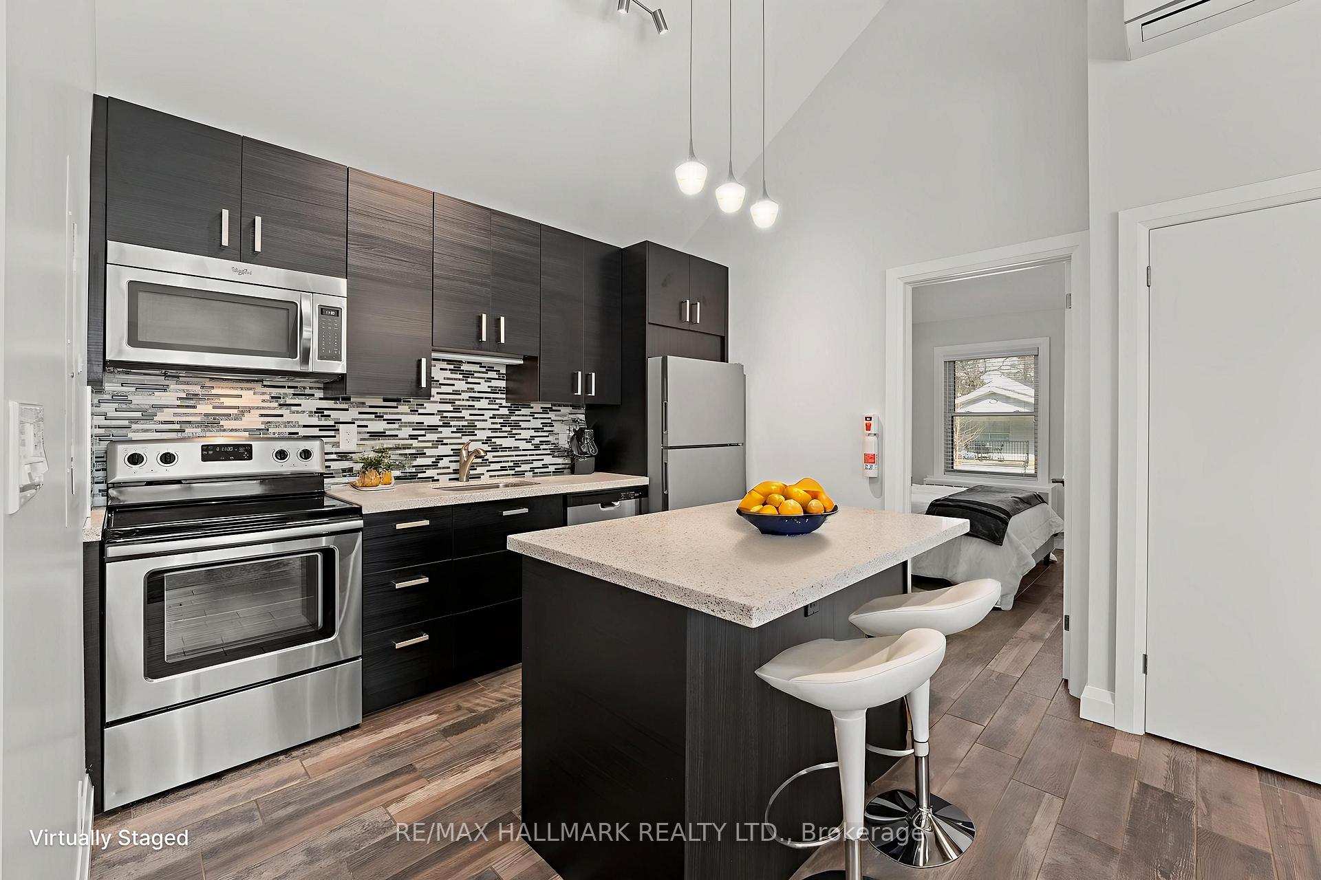 Photo 3 of Unit Unit 1, 276 King Edward Avenue, Toronto, Woodbine-Lumsden — HOMEH