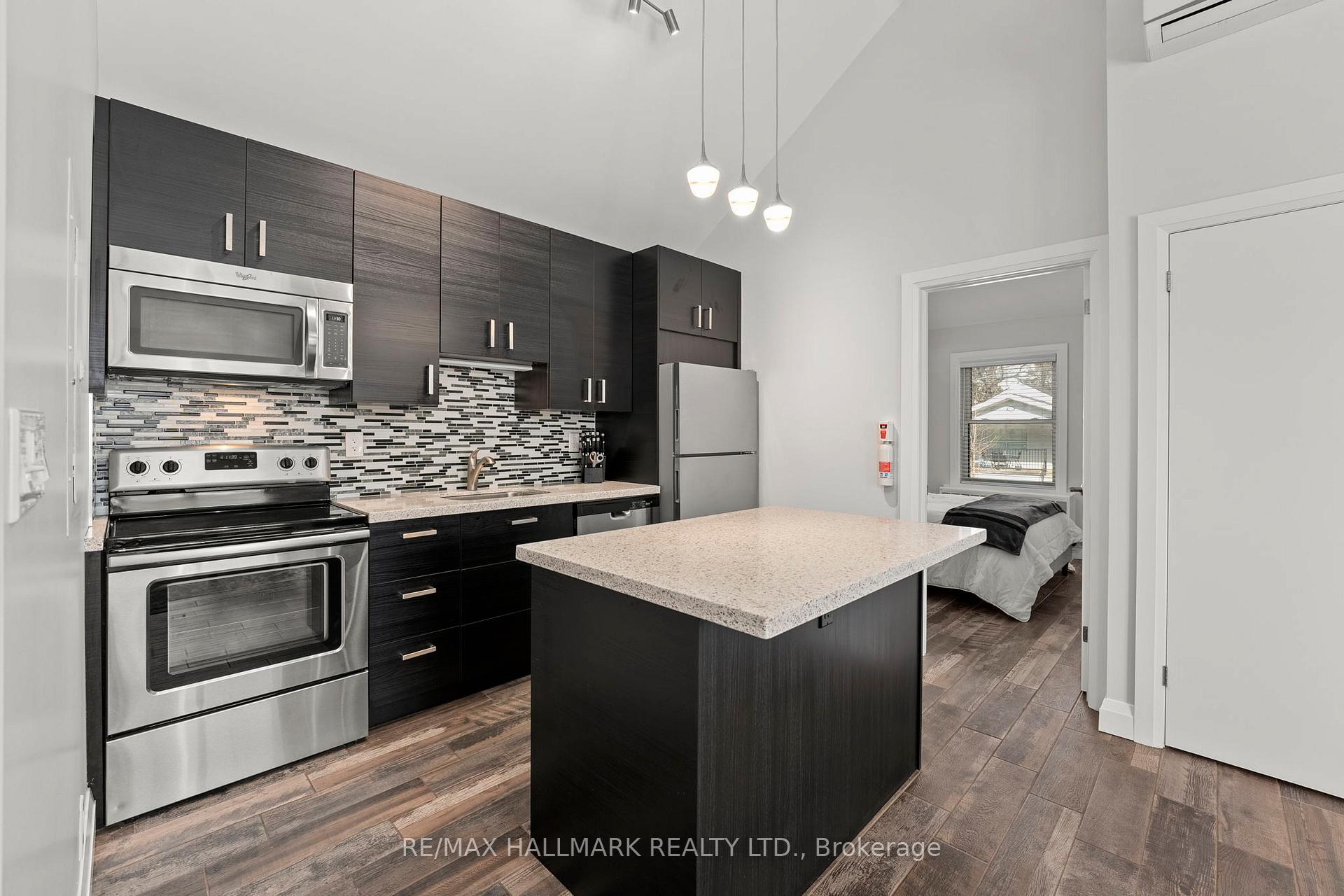 Photo 4 of Unit Unit 1, 276 King Edward Avenue, Toronto, Woodbine-Lumsden — HOMEH