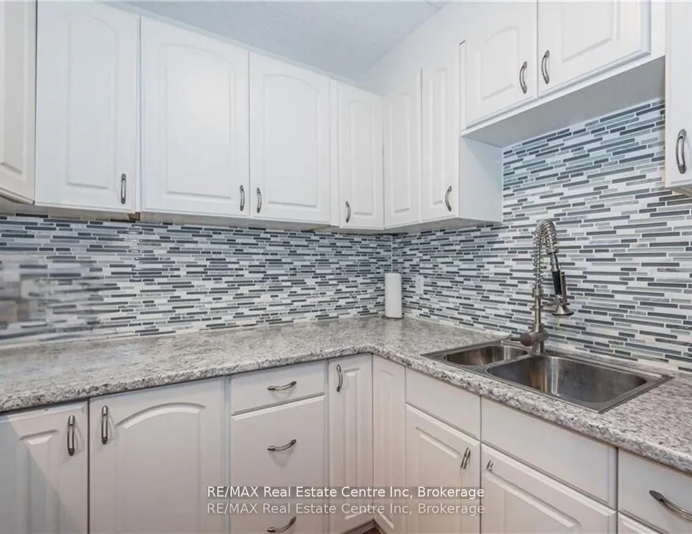 Photo 2 of Unit 310, 65 Silvercreek Parkway N, Guelph, Junction/Onward Willow — HOMEH