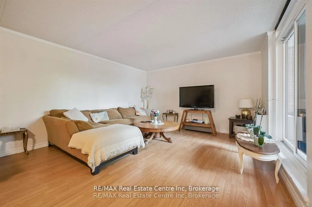 Photo 4 of Unit 310, 65 Silvercreek Parkway N, Guelph, Junction/Onward Willow — HOMEH