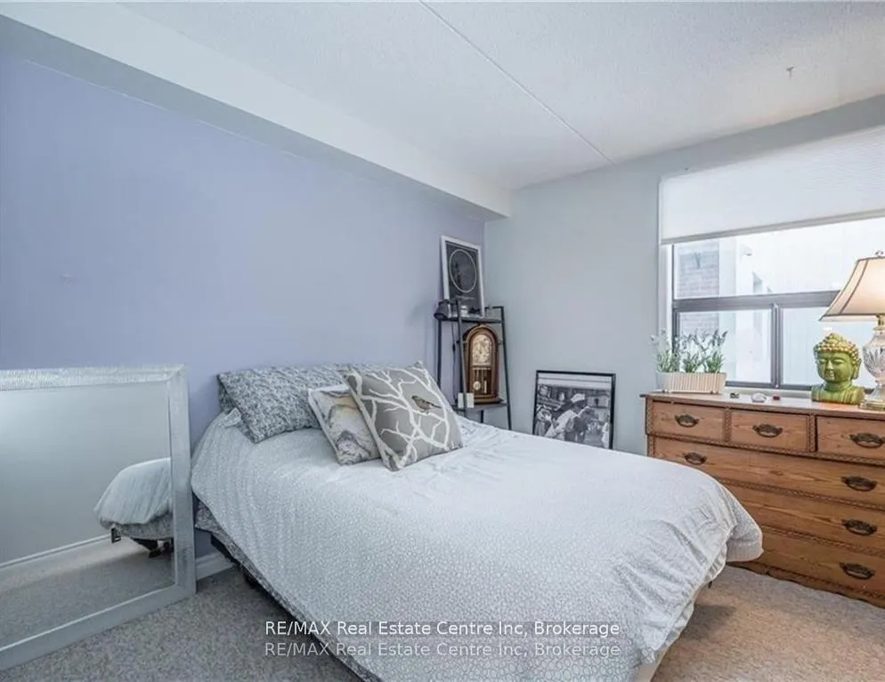 Photo 11 of Unit 310, 65 Silvercreek Parkway N, Guelph, Junction/Onward Willow — HOMEH