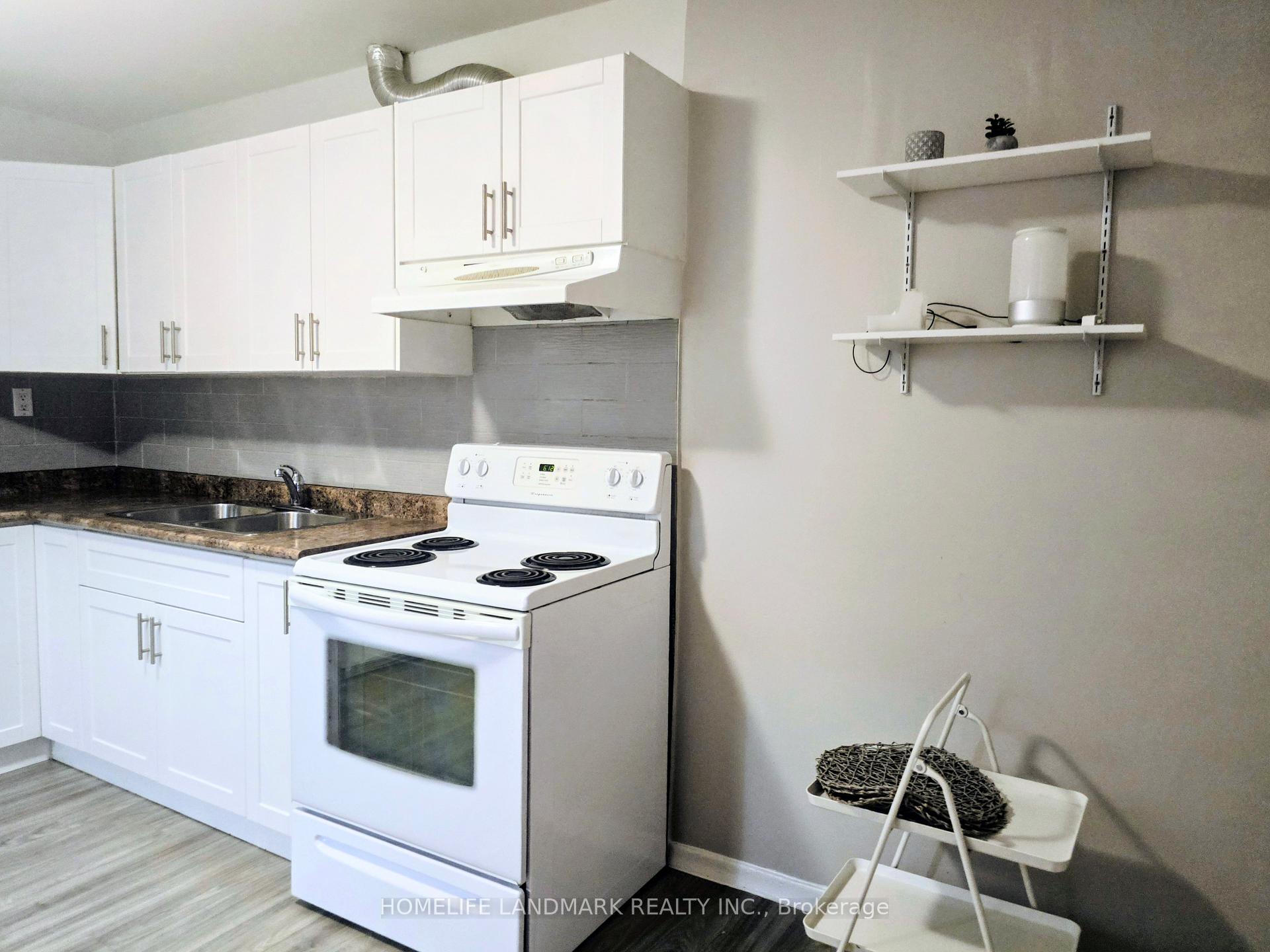 Photo 2 of Unit 1, 2844 Danforth Avenue, Toronto, East End-Danforth — HOMEH