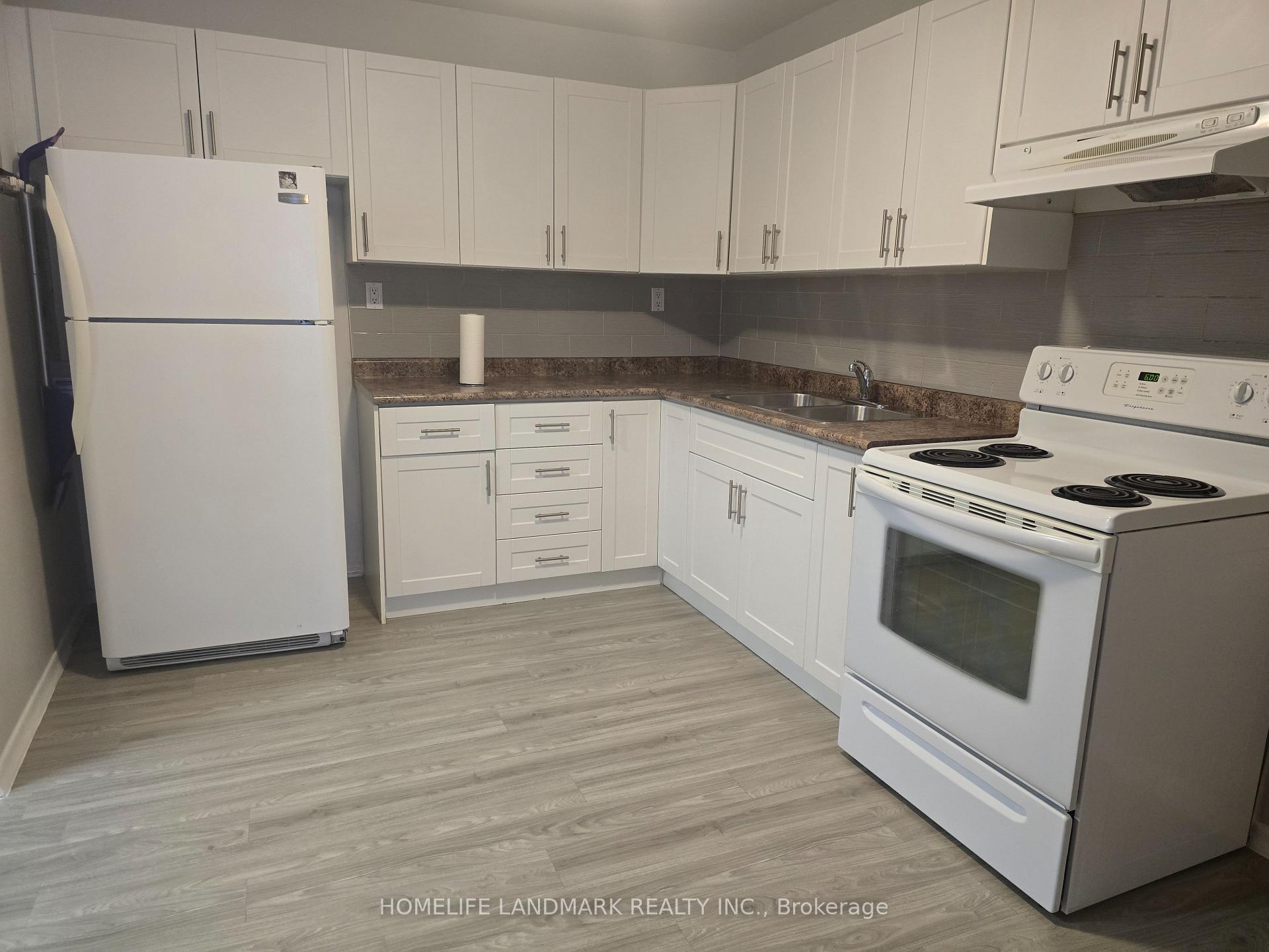 Photo 3 of Unit 1, 2844 Danforth Avenue, Toronto, East End-Danforth — HOMEH