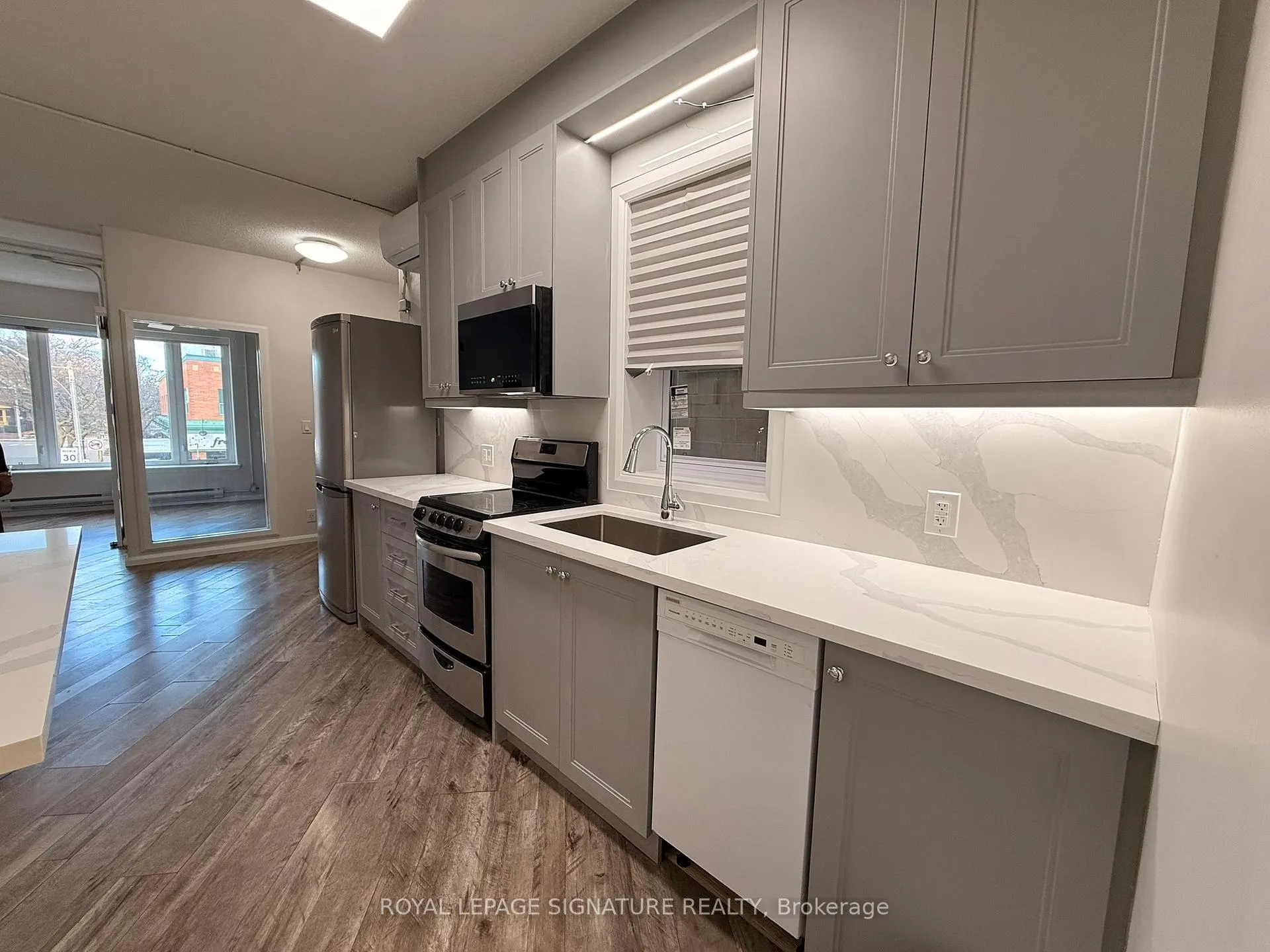 Photo 4 of Unit 1, 345 Danforth Avenue, Toronto, North Riverdale — HOMEH