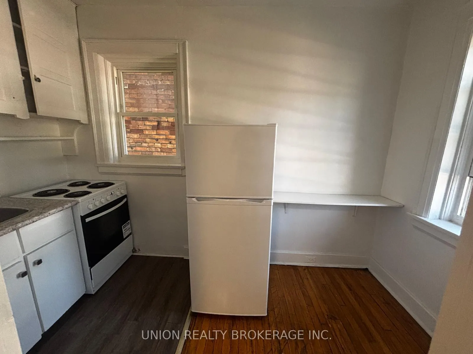 Photo 5 of Unit 202, 2405 Queen Street E, Toronto, The Beaches — HOMEH