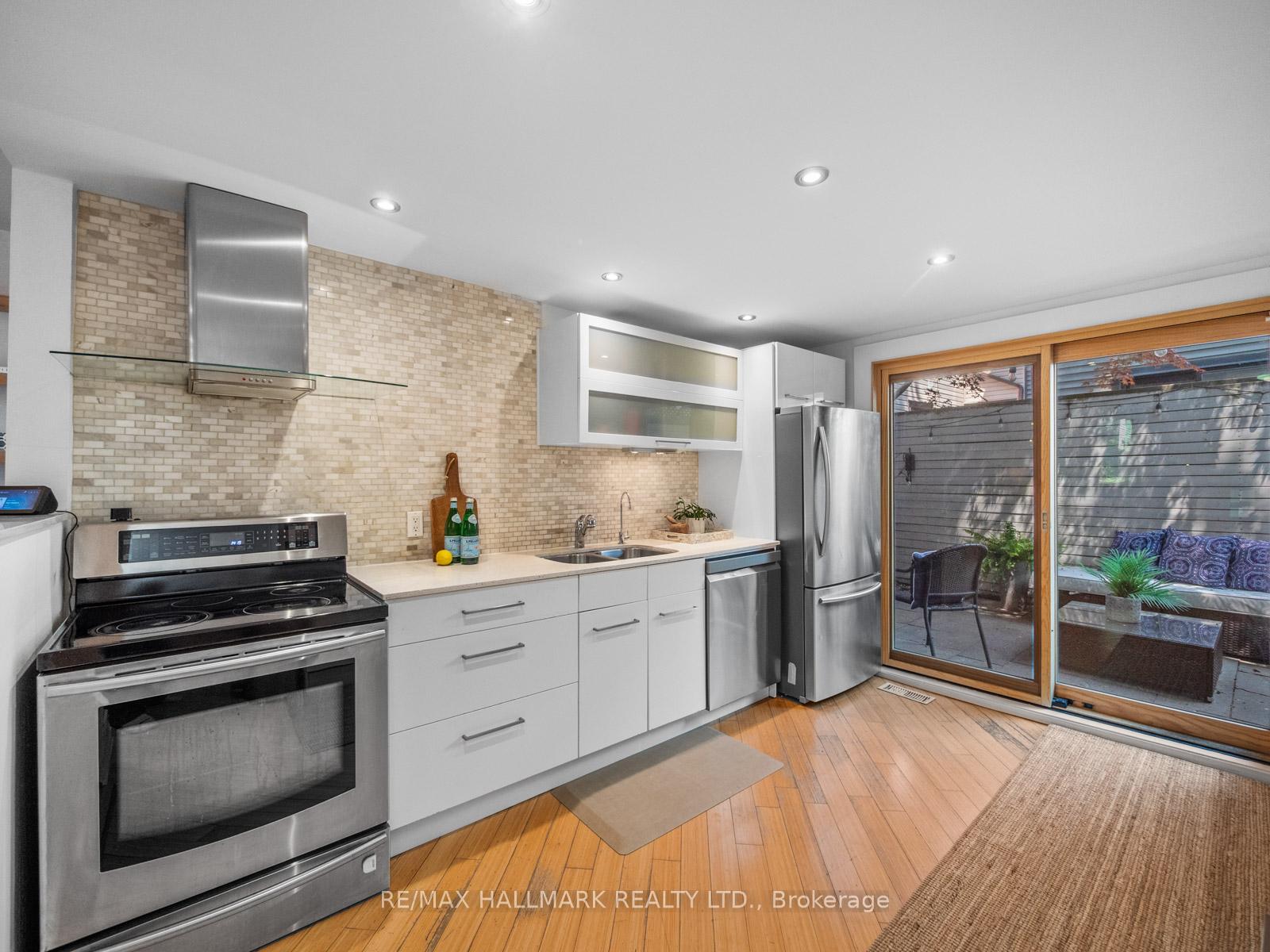 Photo 10 of 69 De Grassi Street, Toronto, South Riverdale — HOMEH