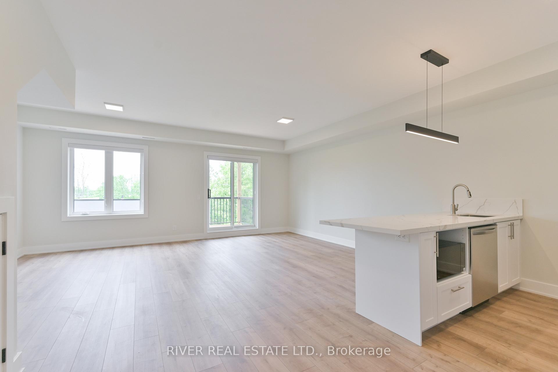 Photo 4 of Unit 3, 2420 Gerrard Street E, Toronto, East End-Danforth — HOMEH