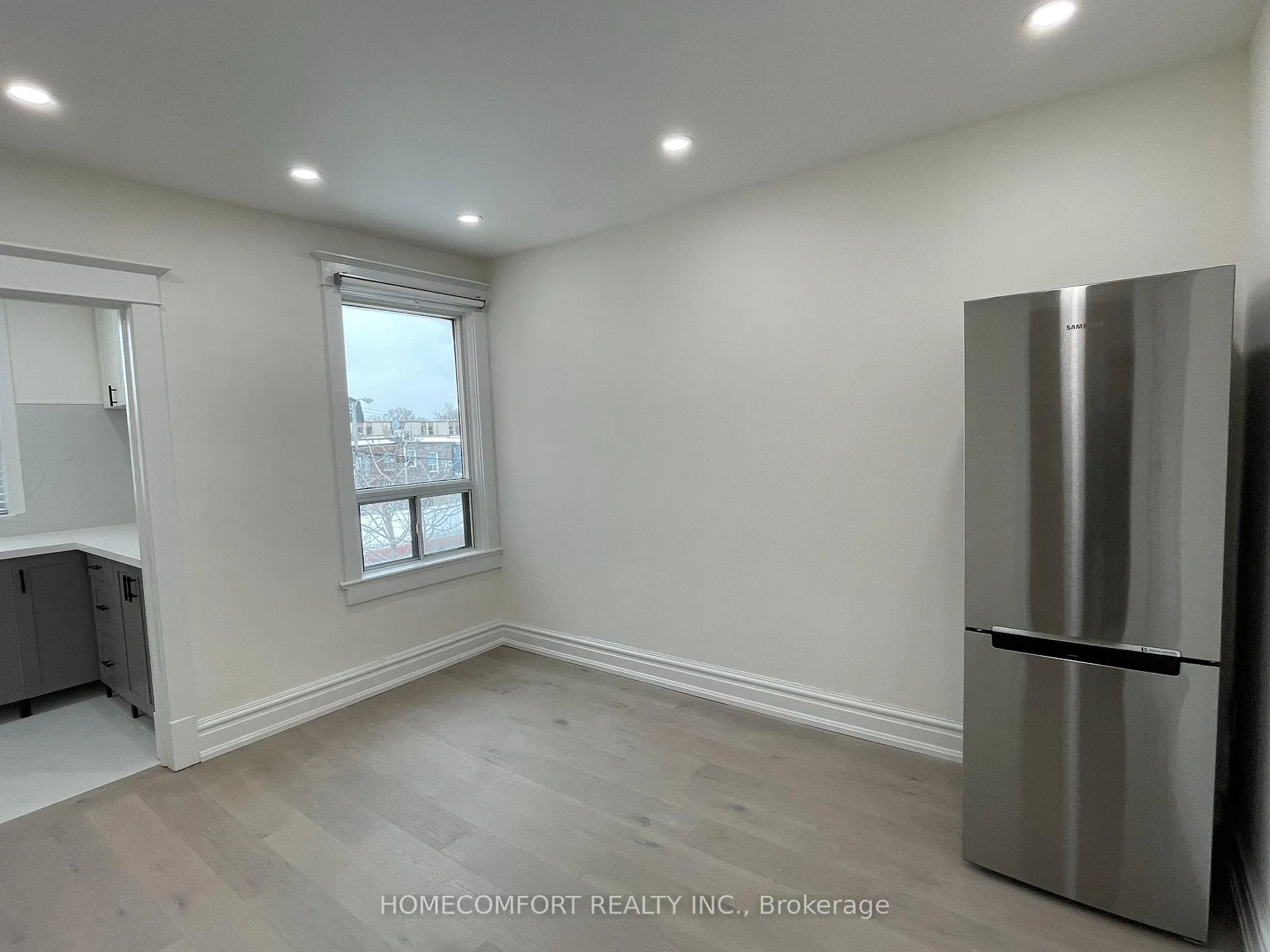 Photo 3 of Unit Upper, 33 Strathmore Boulevard, Toronto, Danforth — HOMEH