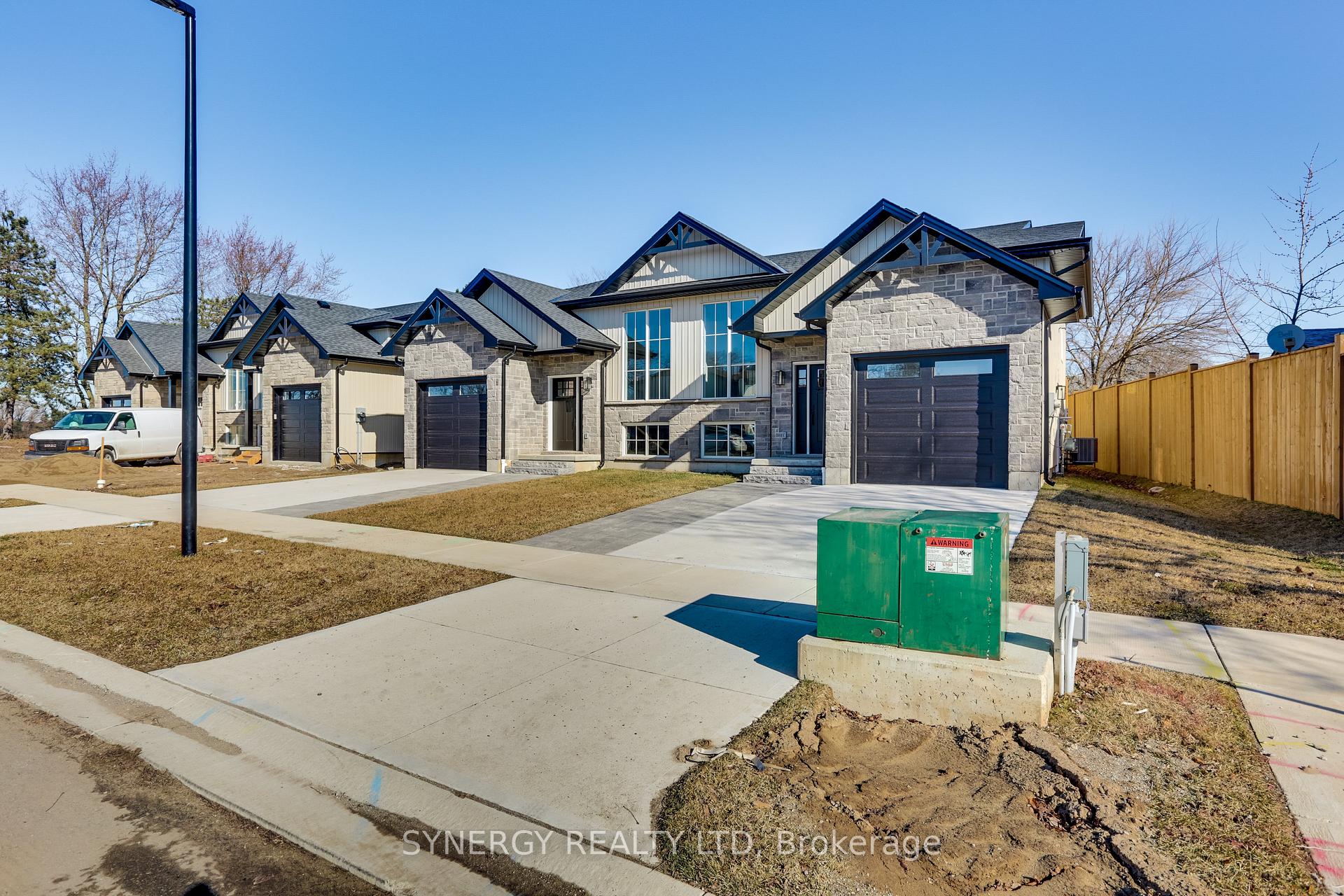 Photo 2 of 1 Haddon Lane, Strathroy-Caradoc, NW — HOMEH