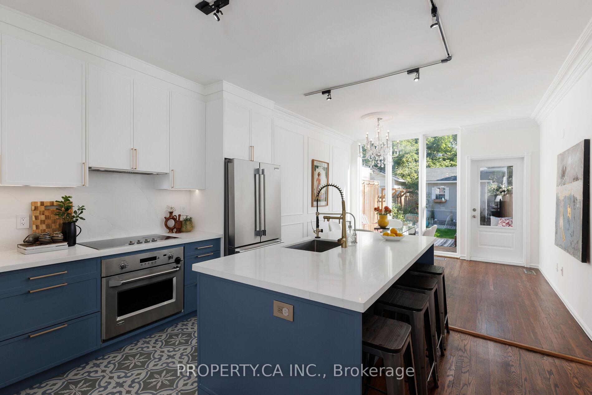 Photo 10 of 419 Rhodes Avenue, Toronto, Greenwood-Coxwell — HOMEH