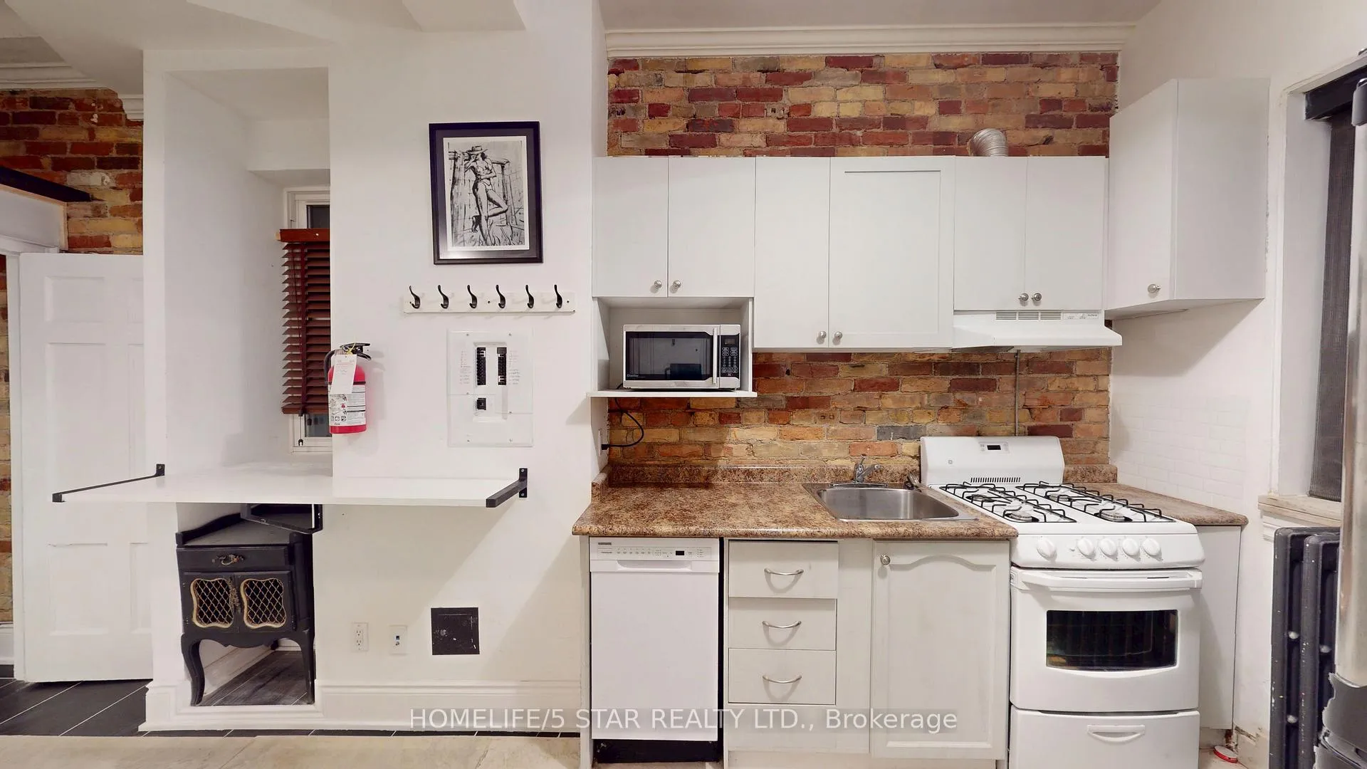 Photo 2 of Unit 206, 1152 Gerrard Street E, Toronto, South Riverdale — HOMEH
