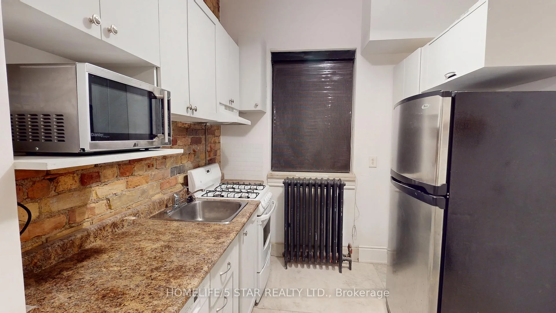 Photo 3 of Unit 206, 1152 Gerrard Street E, Toronto, South Riverdale — HOMEH