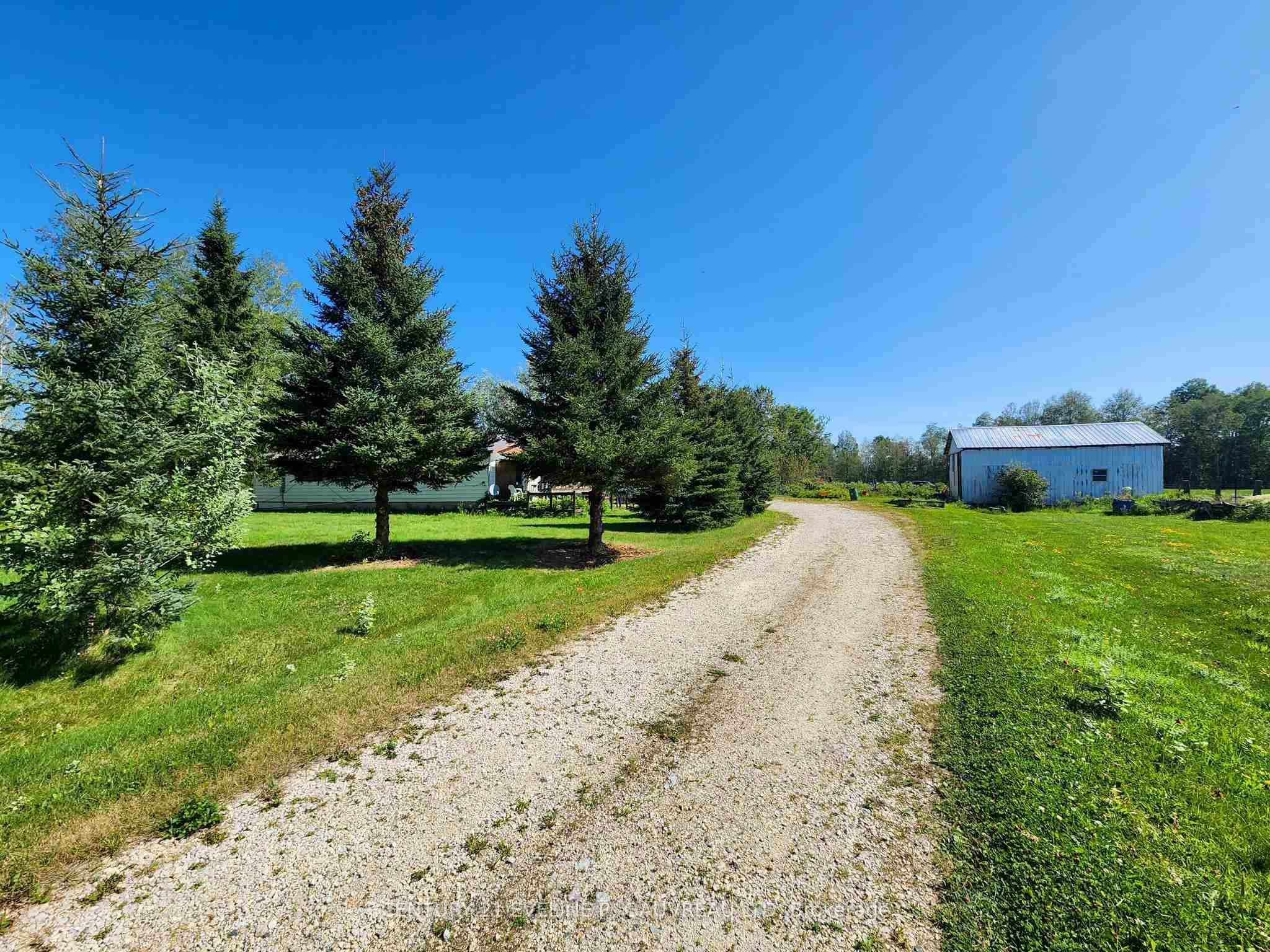 Photo 5 of 951529 Highway 569, Timiskaming, TIM - Outside - Rural — HOMEH