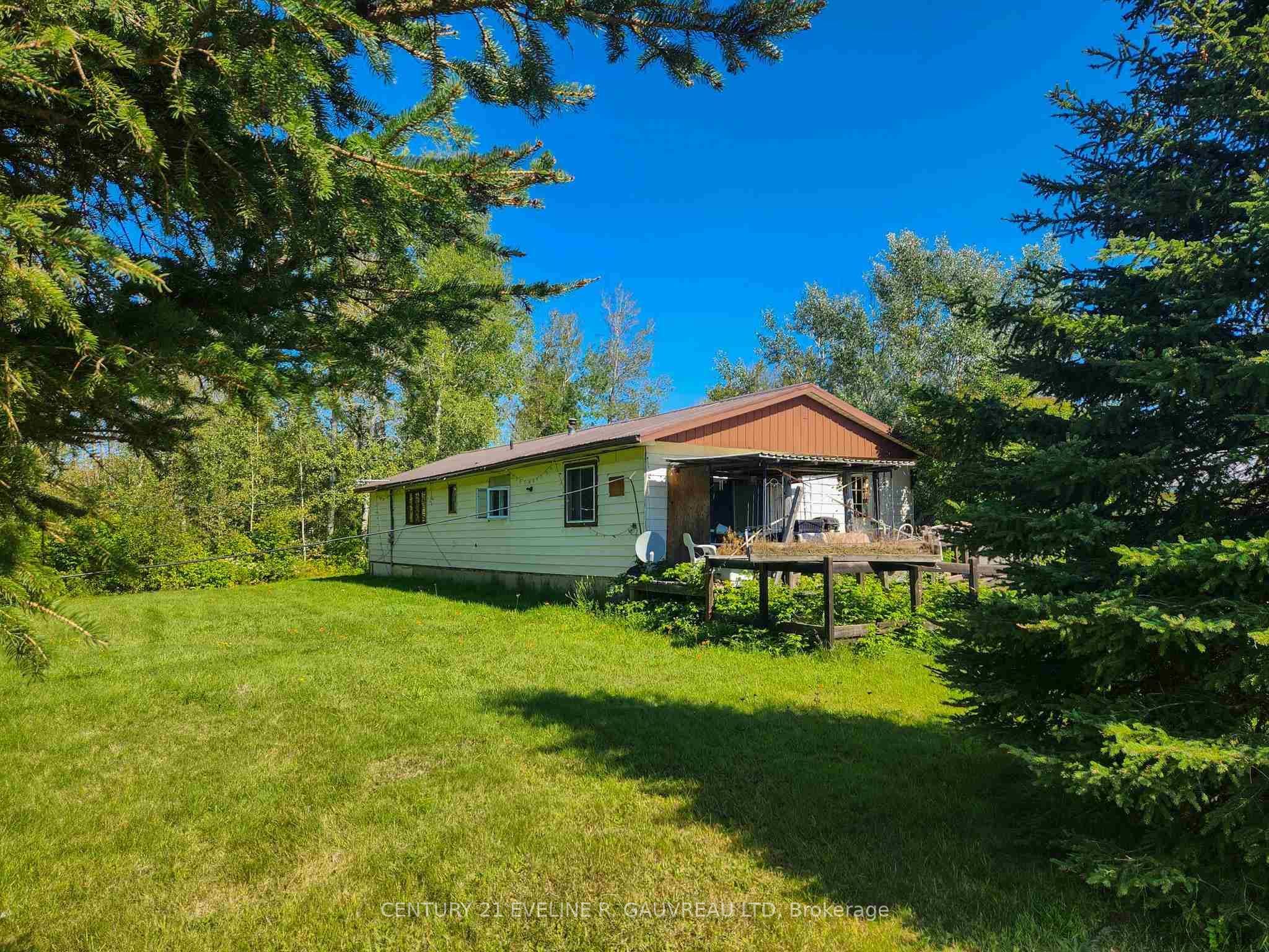 Photo 7 of 951529 Highway 569, Timiskaming, TIM - Outside - Rural — HOMEH