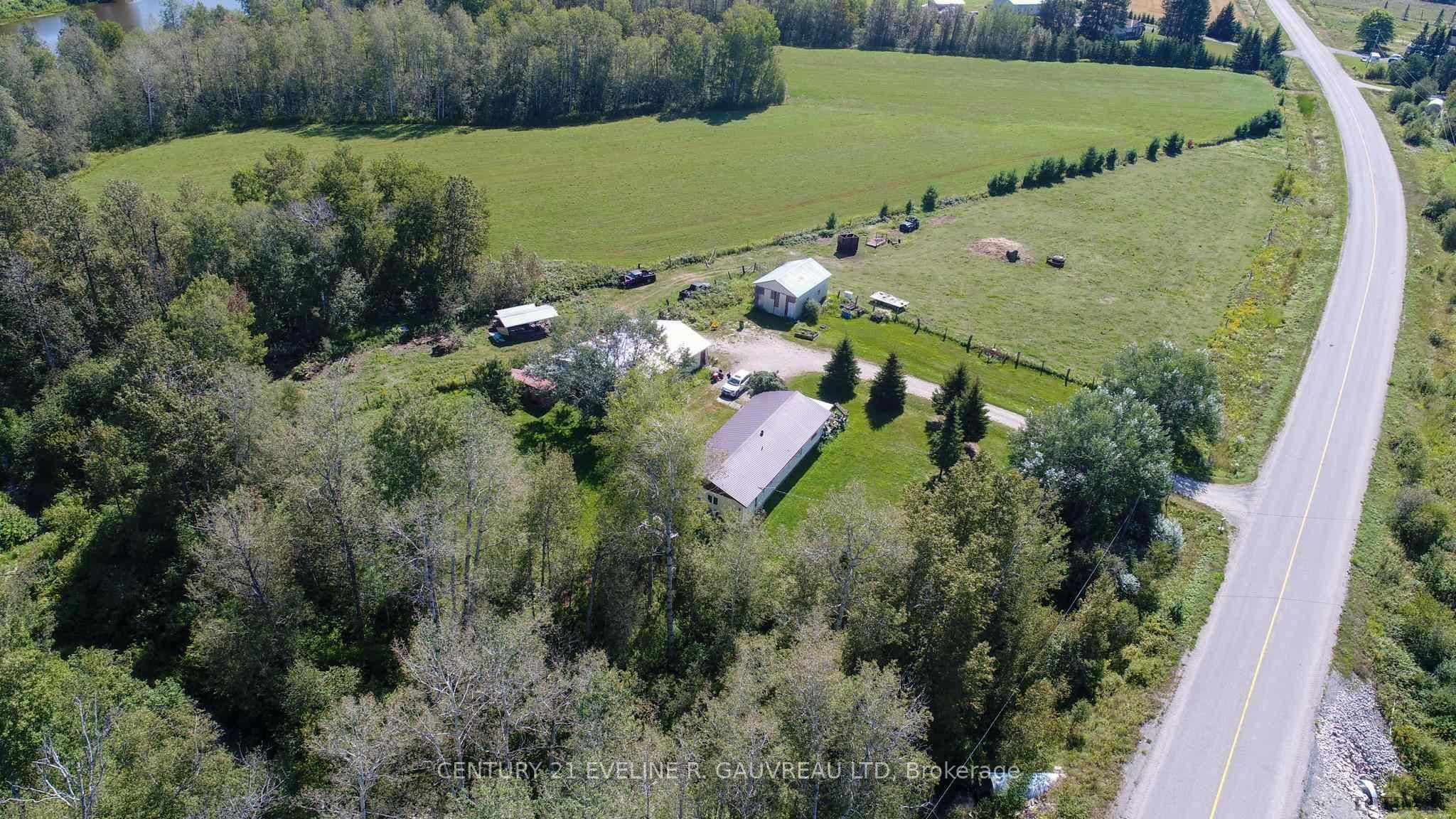 Photo 59 of 951529 Highway 569, Timiskaming, TIM - Outside - Rural — HOMEH