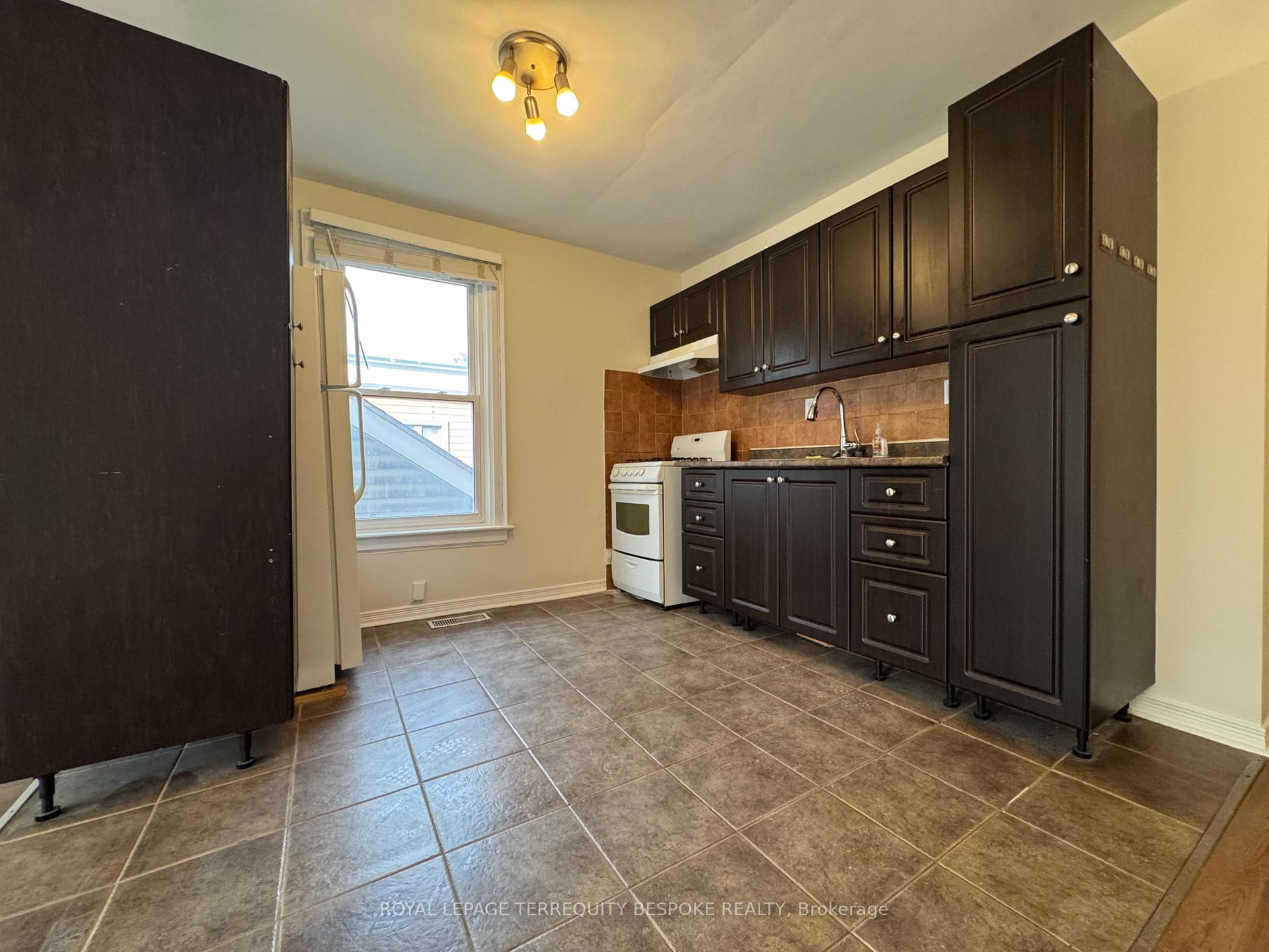 Photo 3 of Unit 3 - upper, 19 Lewis Street, Toronto, South Riverdale — HOMEH