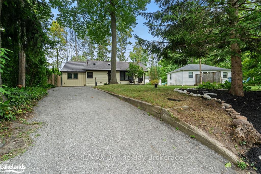 Photo 6 of 1941 Tiny Beaches Road S, Tiny, Rural Tiny — HOMEH