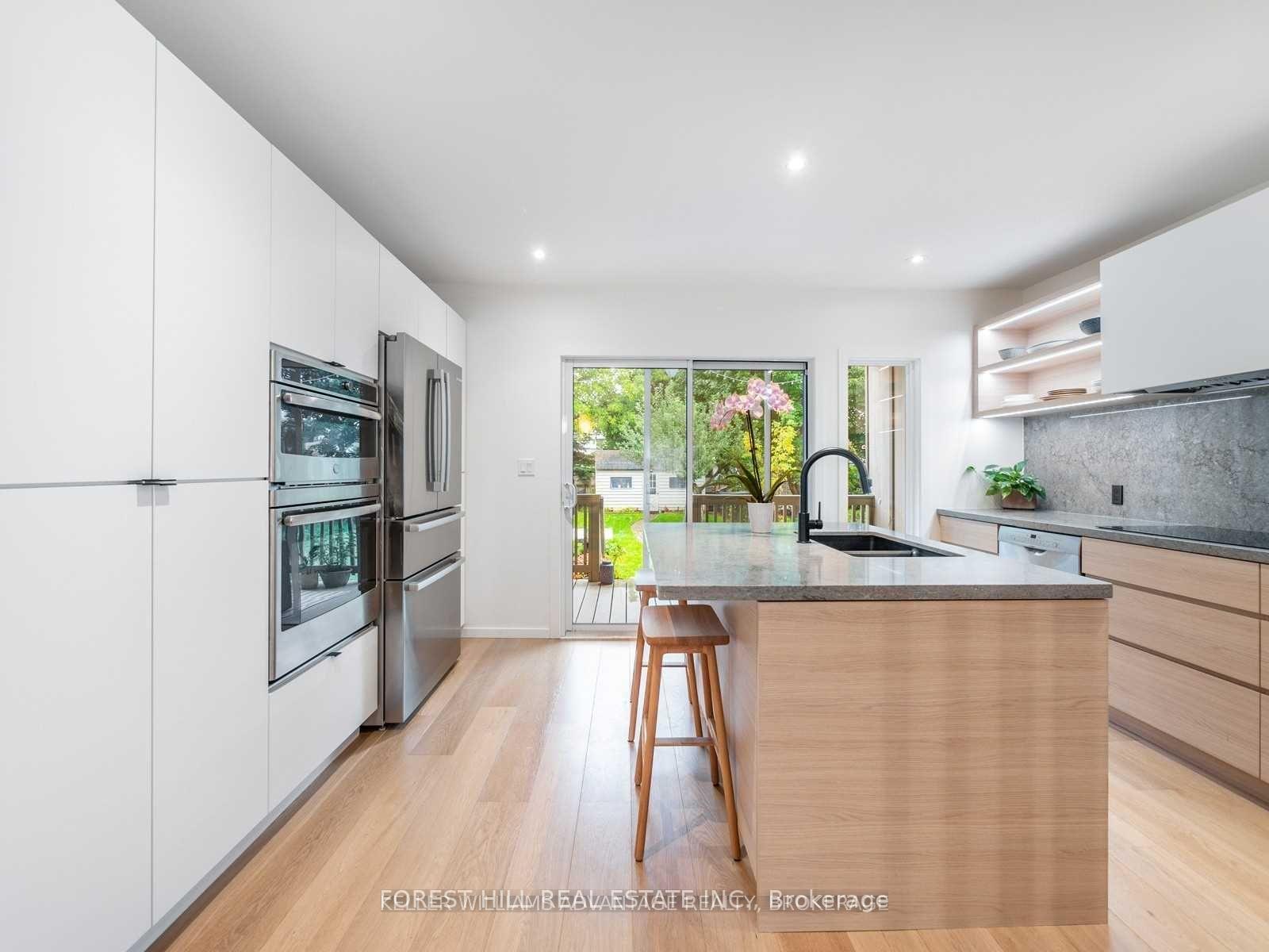 Photo 12 of 125 Torrens Avenue, Toronto, East York — HOMEH