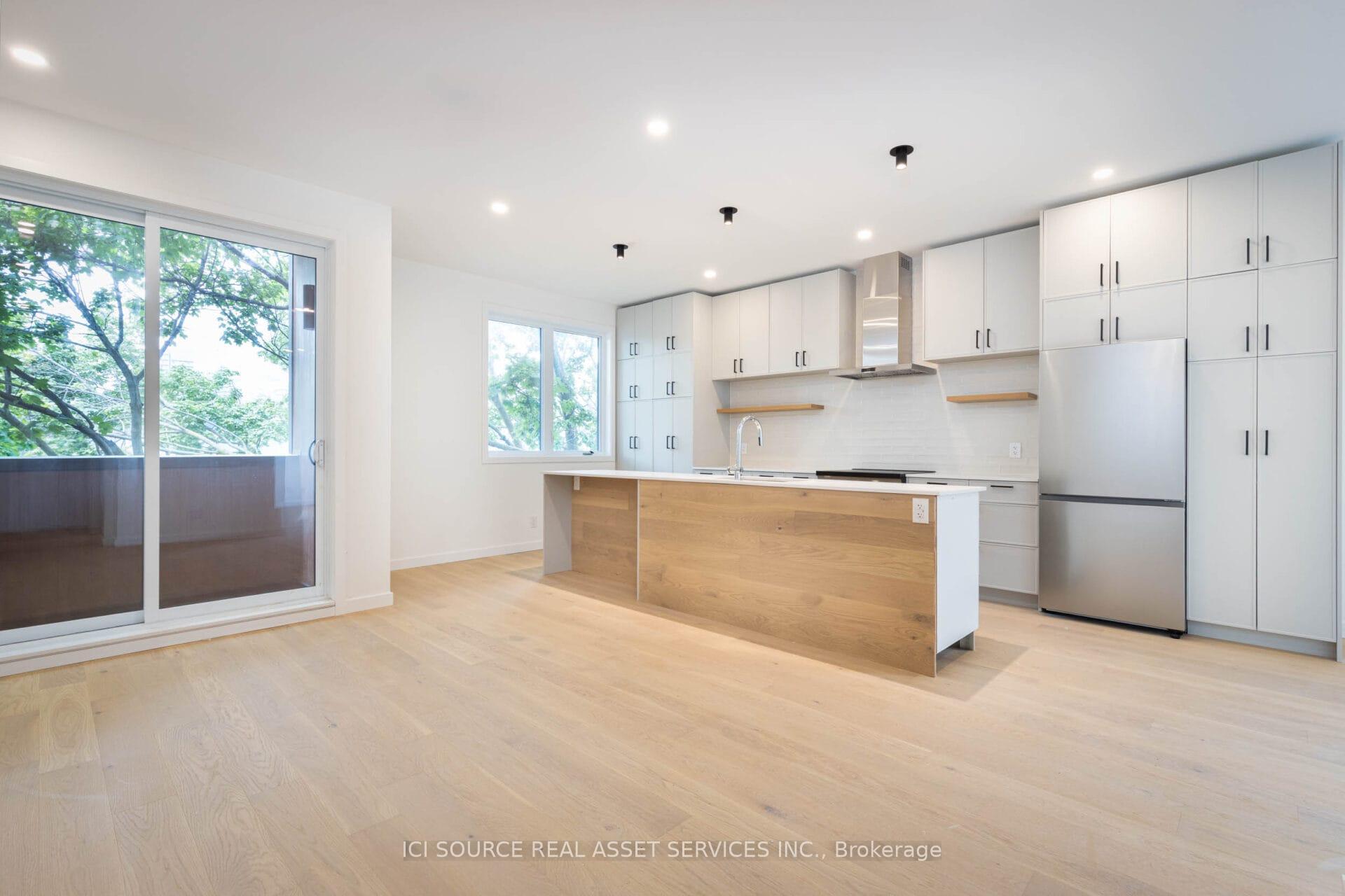 Photo 2 of Unit A, 50 Mcgee Street, Toronto, South Riverdale — HOMEH