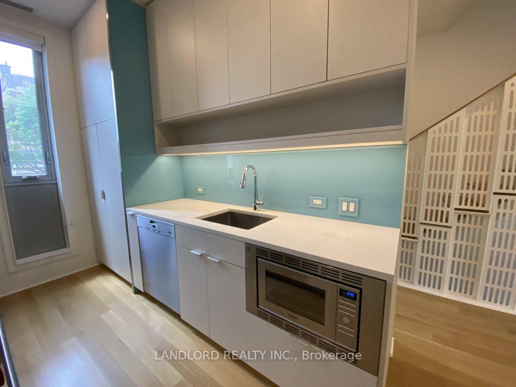 Photo 2 of Unit Th2, 15 Cummings Street, Toronto, South Riverdale — HOMEH