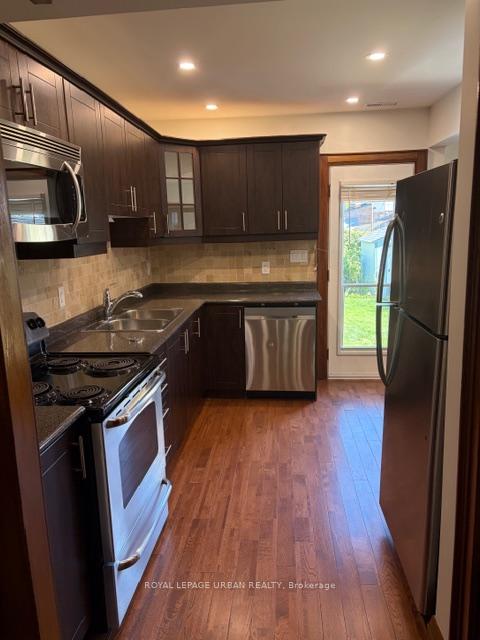 Photo 13 of Unit Main Floor, 145 Dewhurst Boulevard, Toronto, Danforth Village-East York — HOMEH