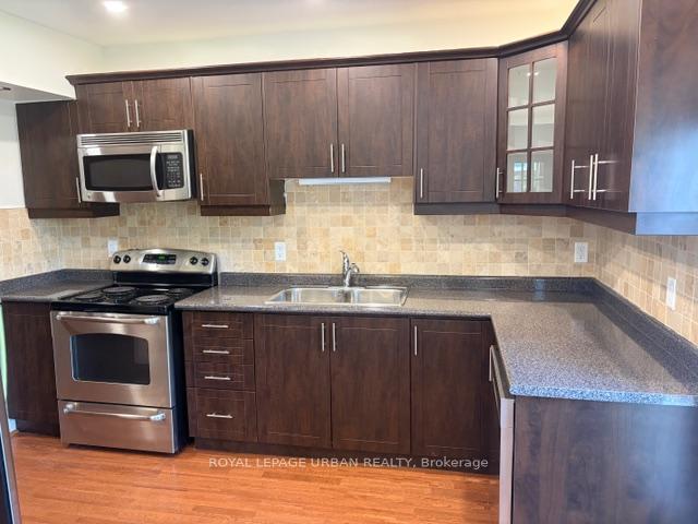 Photo 15 of Unit Main Floor, 145 Dewhurst Boulevard, Toronto, Danforth Village-East York — HOMEH
