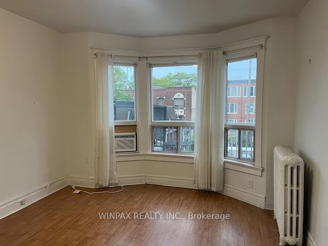 Photo 3 of Unit Apt # 2, 2222 Queen Street E, Toronto, The Beaches — HOMEH