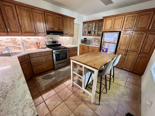 Photo 10 of 54 Strathcona Avenue, Toronto, Blake-Jones — HOMEH