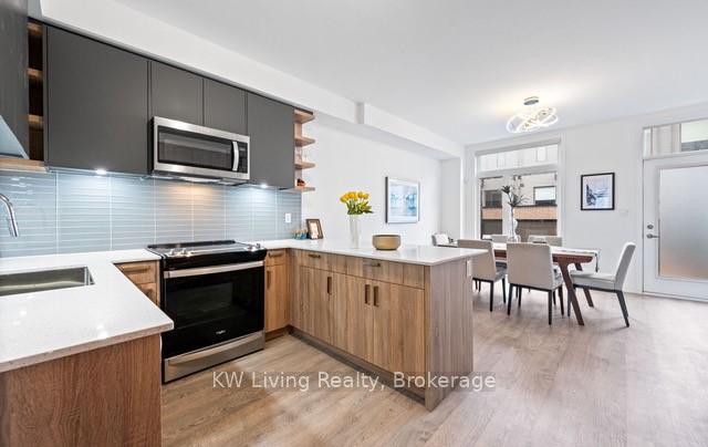 Photo 9 of 52 Hooyo Terrace, Toronto, Englemount-Lawrence — HOMEH