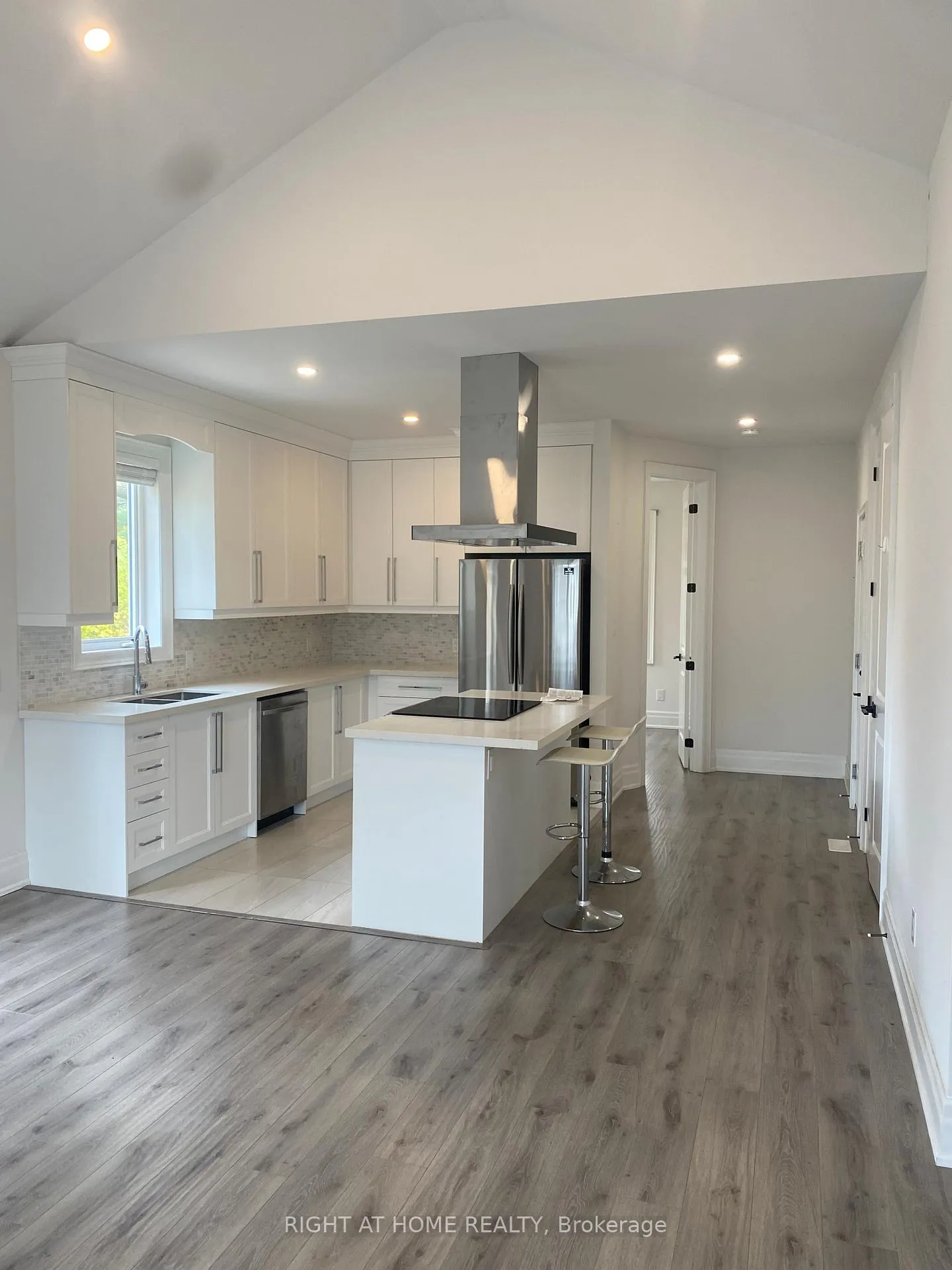 Photo 2 of Unit A, 72 Old Mosley Street, Wasaga Beach — HOMEH