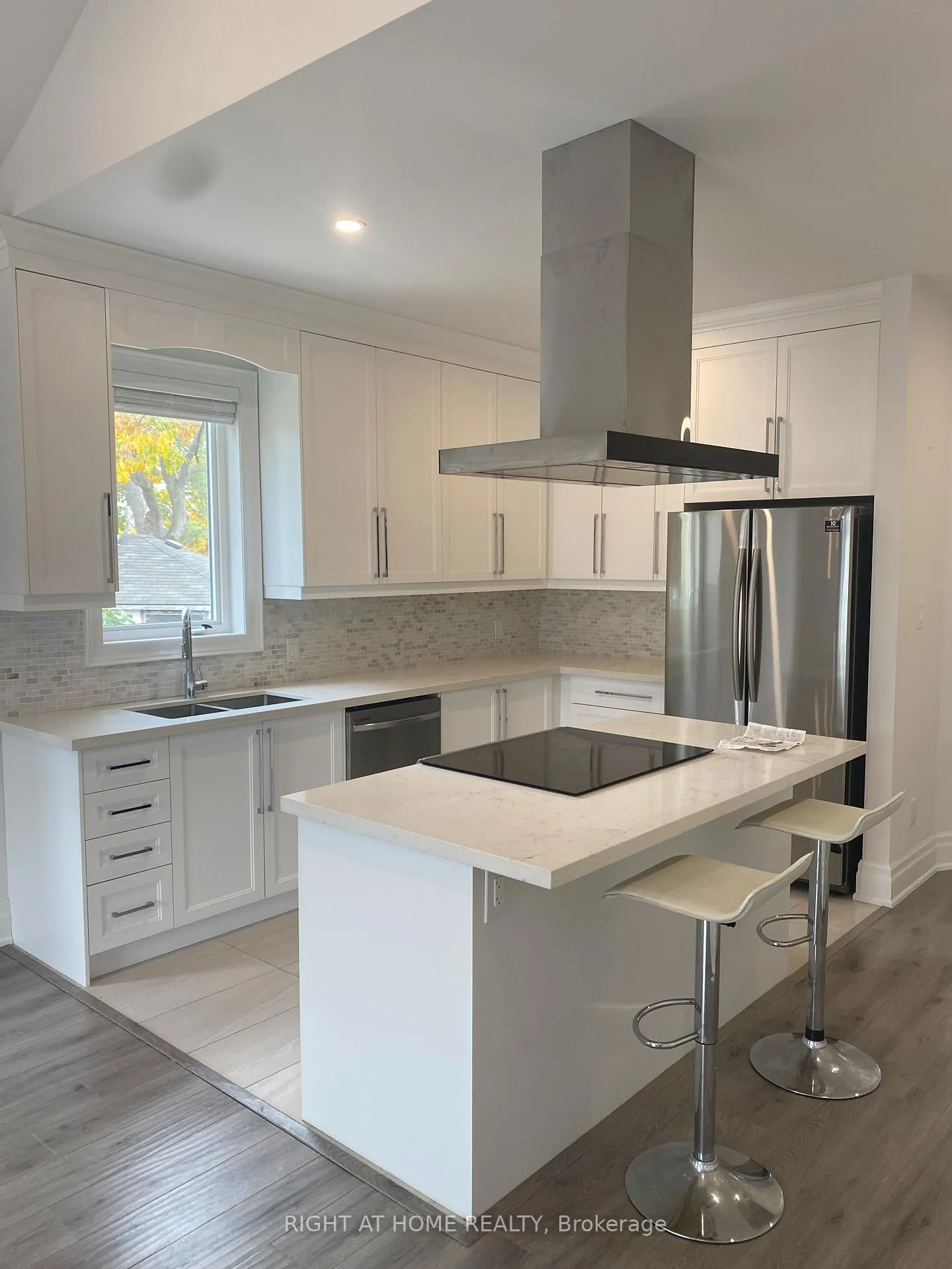 Photo 3 of Unit A, 72 Old Mosley Street, Wasaga Beach — HOMEH