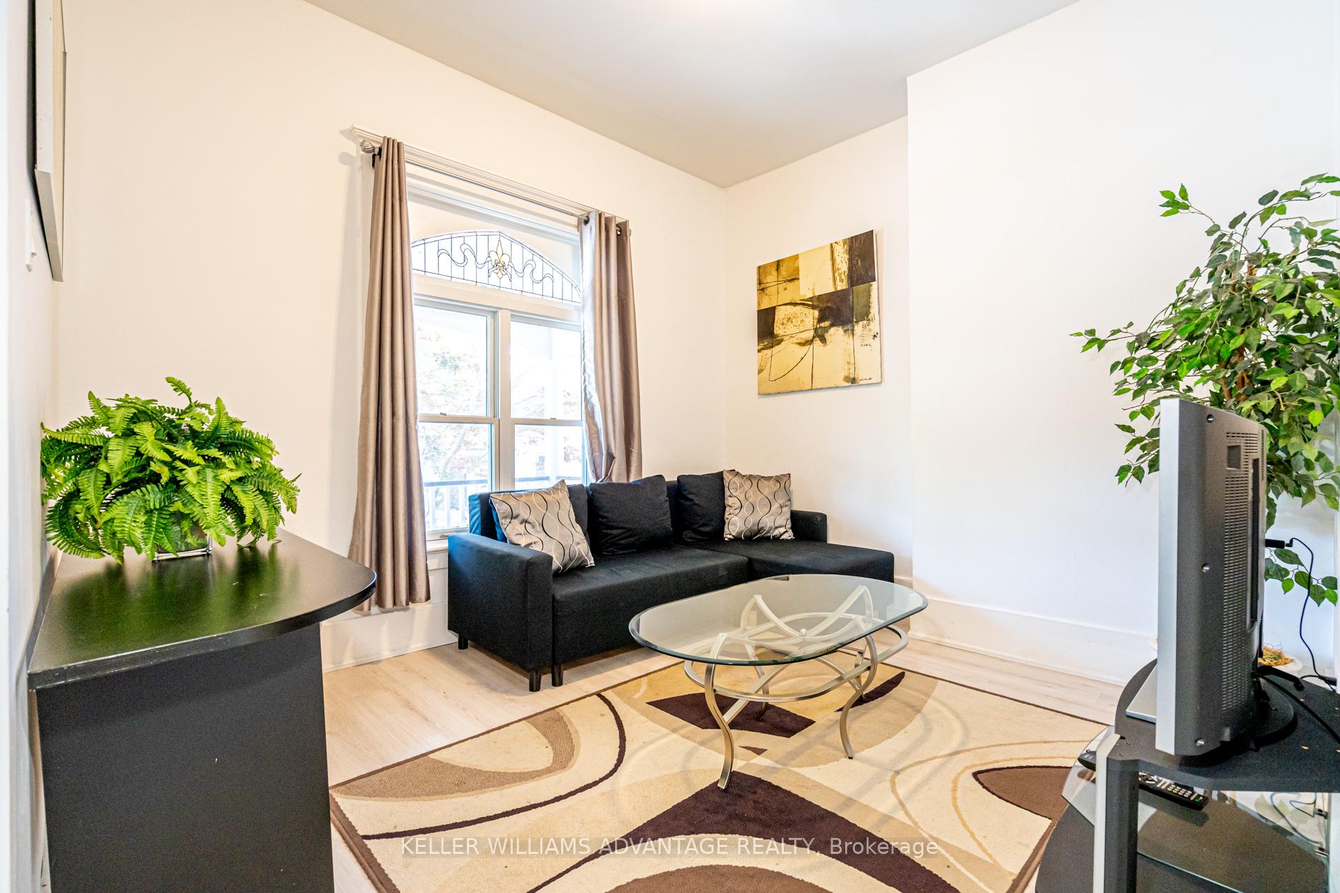 Photo 2 of 107 Kenilworth Avenue, Toronto, The Beaches — HOMEH
