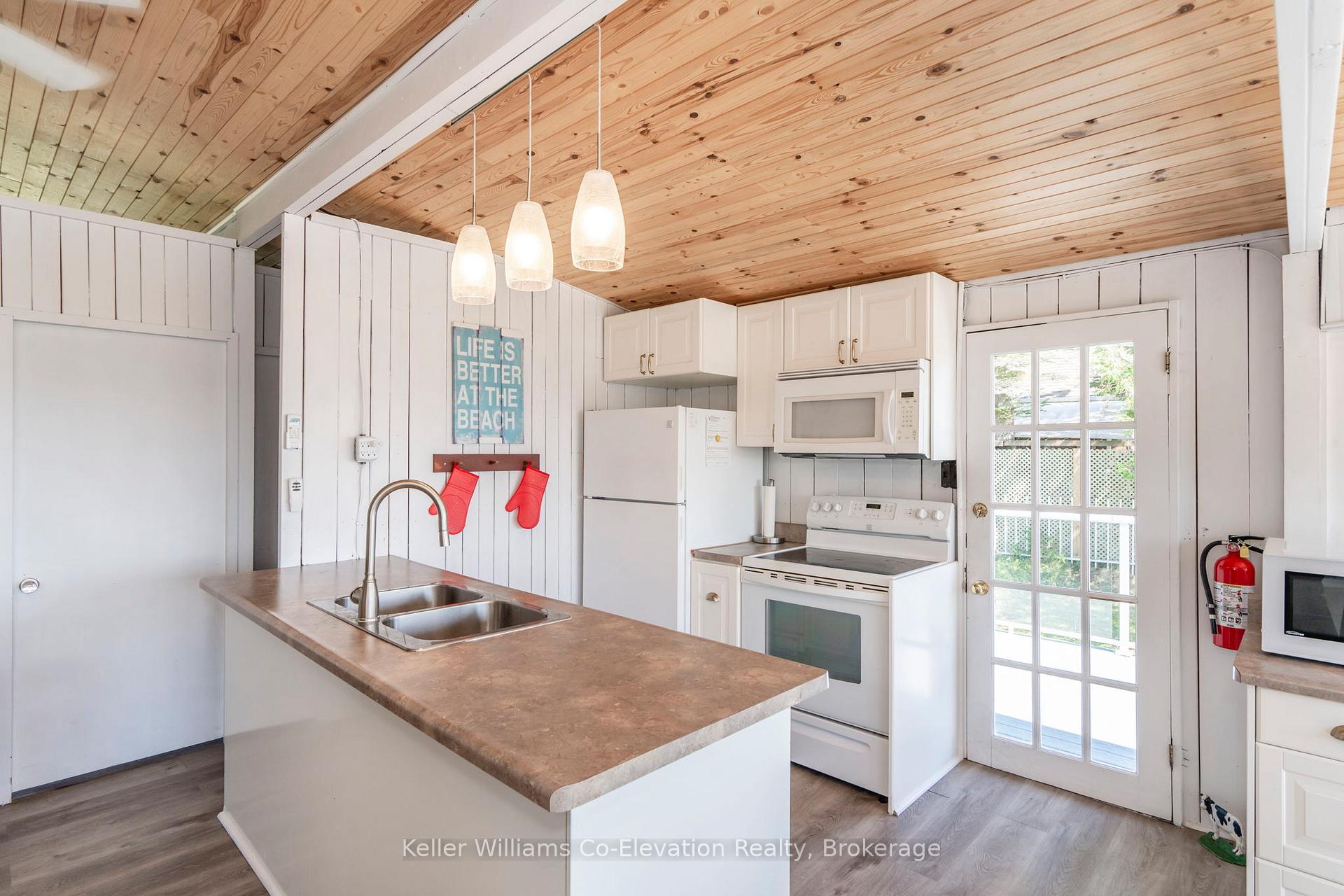 Photo 9 of 1486 Tiny Beaches Road N, Tiny, Rural Tiny — HOMEH